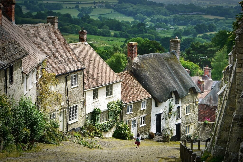 england, shaftesbury, united kingdom, british, landscape, village, hill, thatched roof, fairy tale world, fairytale, england,