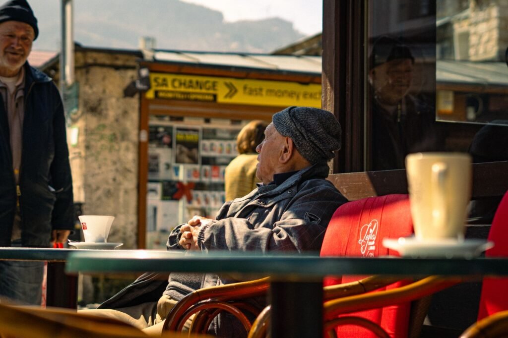 Adults having a relaxed conversation in a Scarborough café