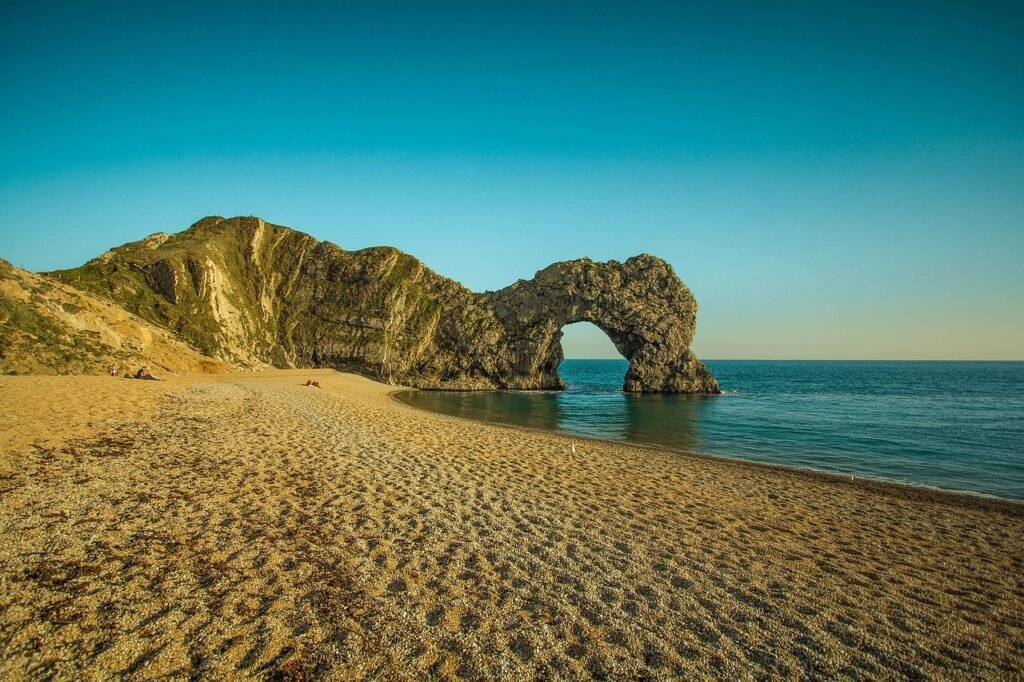 durdle door, limestone arch, ocean, beach, cliff, rock, caves, nature, seaside country, dorset, wareham, united kingdom