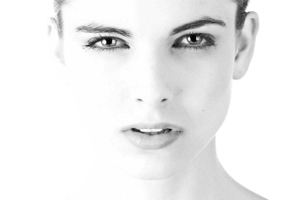 woman, face, portrait, model, skin, makeup, young woman, close up, modeling, studio photography, monochrome, black and white,