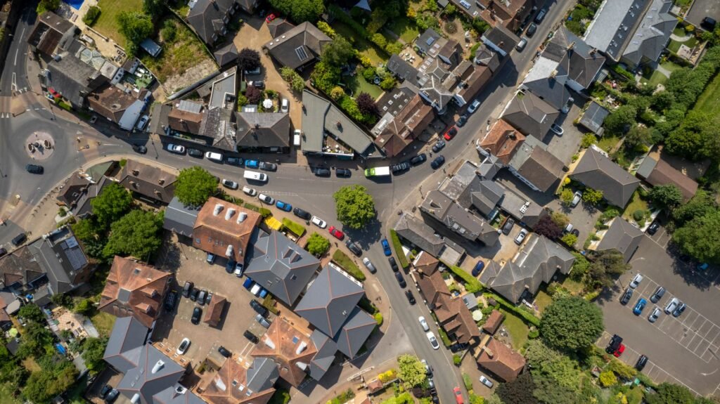 Vibrant aerial view of Thames Ditton streets showcasing urban layout and traffic.