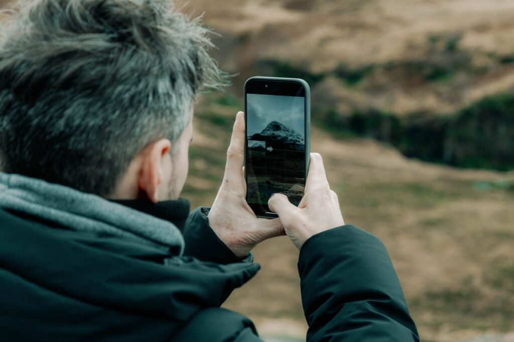 Person reviewing online profile details and a safety checklist in Edinburgh