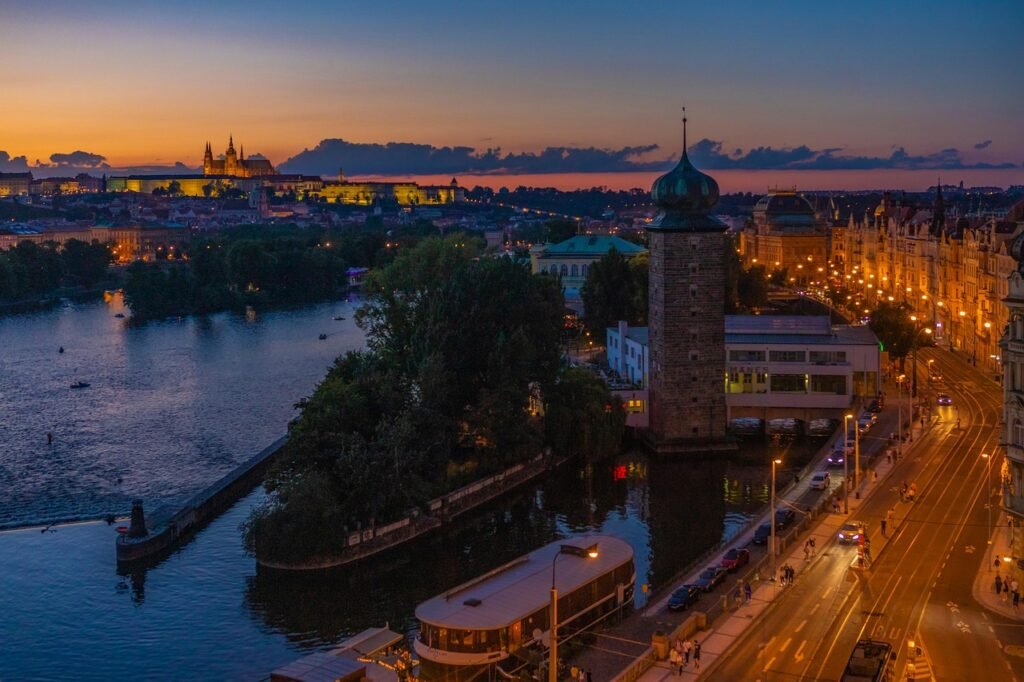 sunset, city, lake, road, boat, nature, citadel, street lights, lights, port, tower, river, street, urban, dusk, evening