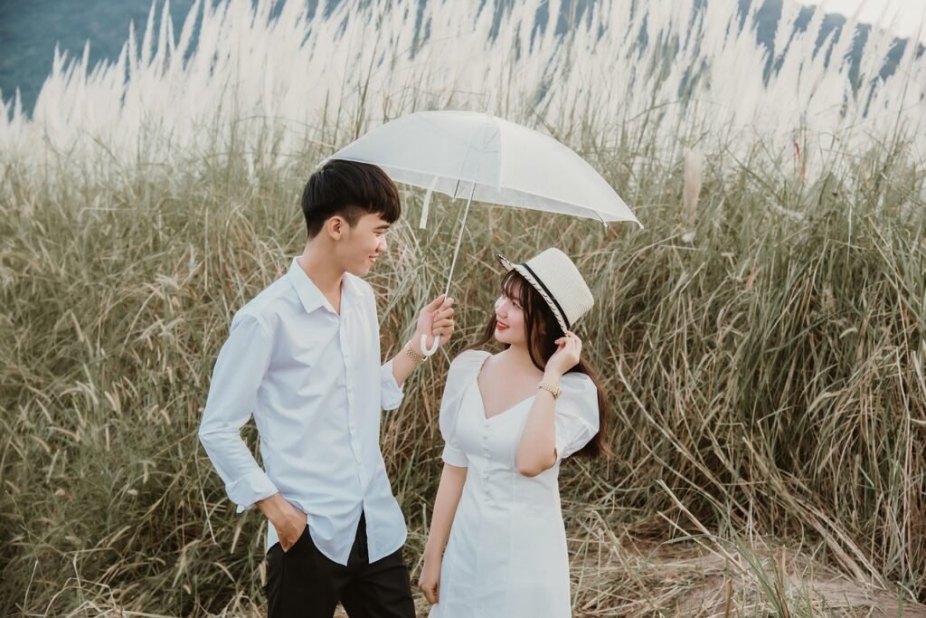 couple, love, umbrella, man, woman, boyfriend, girlfriend, relationship, lovers, sweet, happy, young, smile, outdoors, meadow