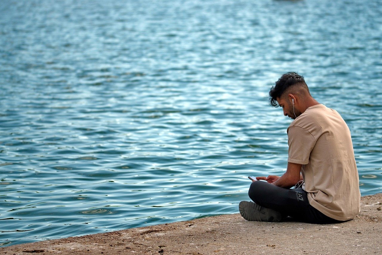 boy, young, phone, relaxation, spring, park, lakeshore, recreation, person, listening, music, headphones, smartphone, ears, n