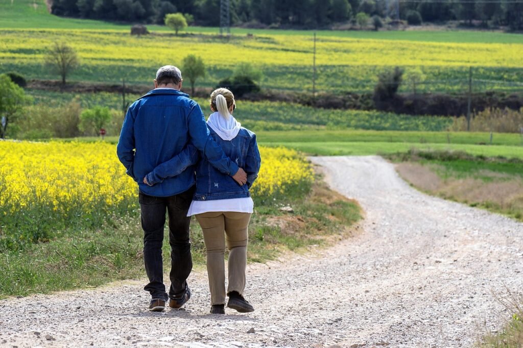 walk, couple, path, rural, man and woman, flower background, together, exercise, health, love, romance, romantic, relax, natu