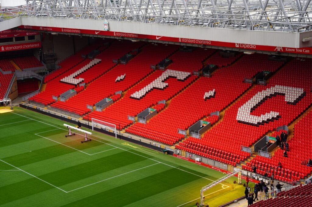 View of Anfield Stadium seating with prominent LFC letters. Perfect capture of iconic Liverpool FC venue.