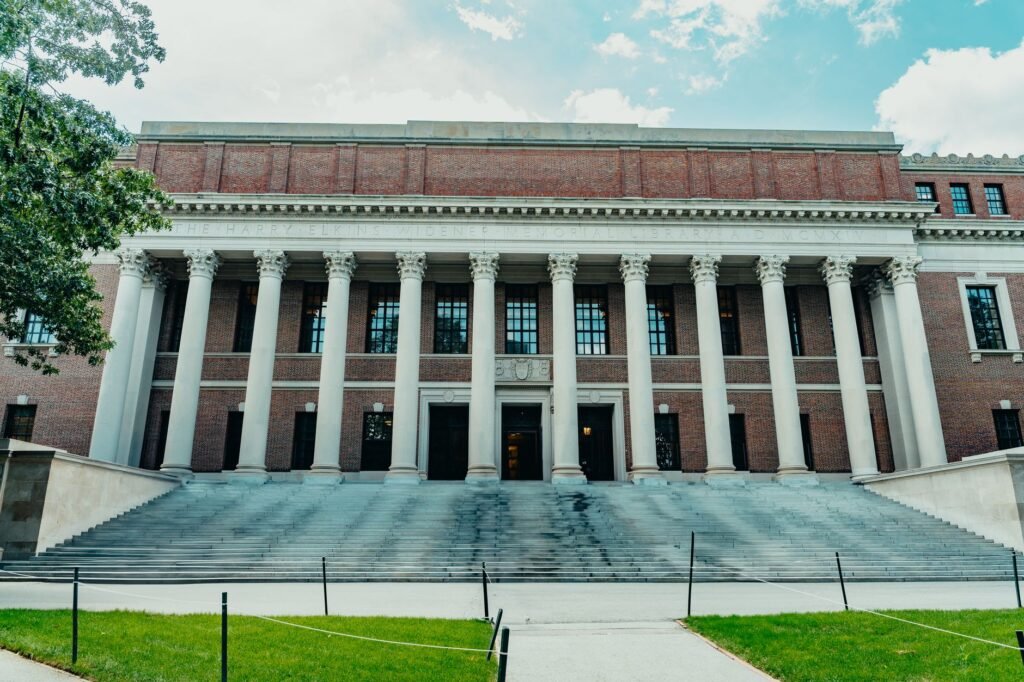 The majestic front façade of Widener Library at Harvard University, Cambridge, with classic columns and vast steps.