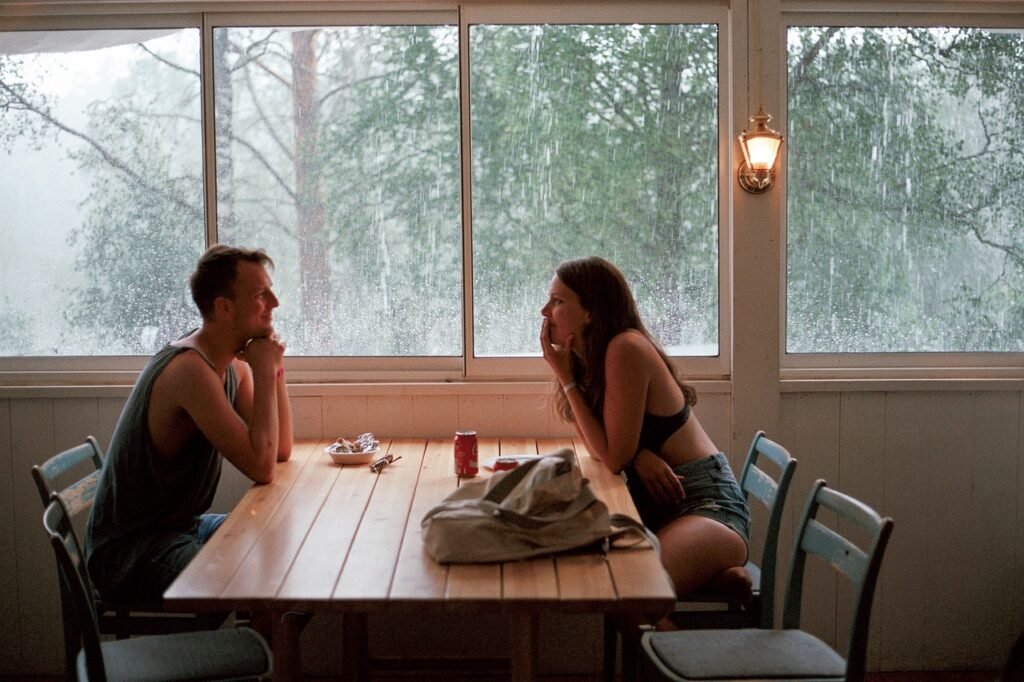 people, man, woman, date, love, intimate, nature, lunch, windows, woods, forest, green, rain, chairs, table