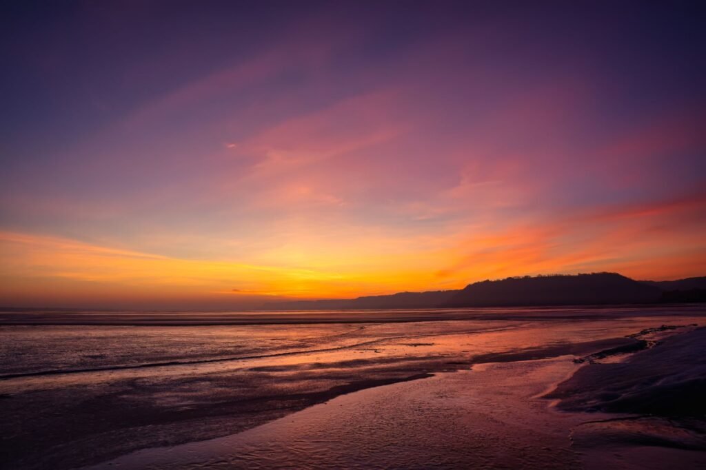 A breathtaking sunset view over the frozen shores of Lake City, Minnesota.