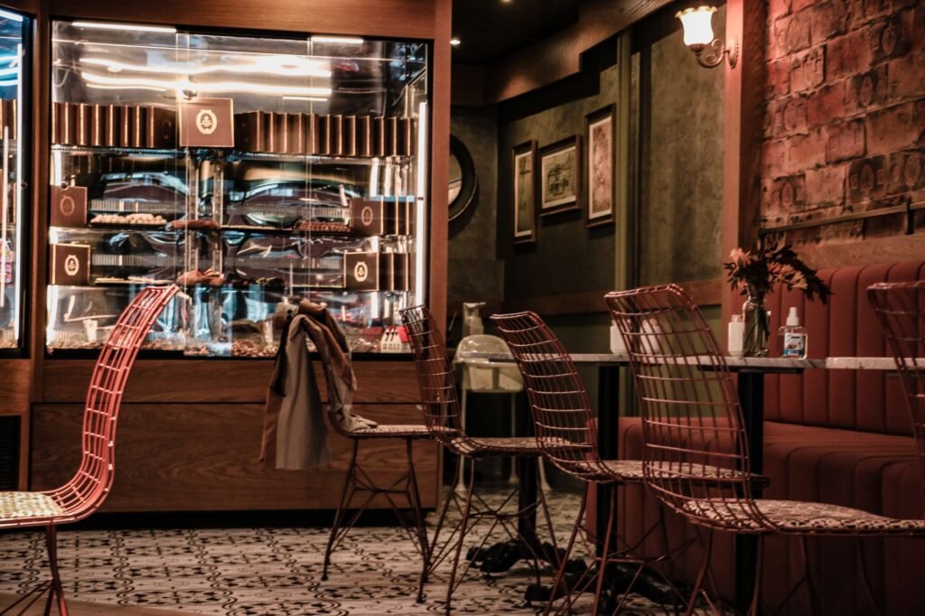 Warm and inviting café setting in Istanbul, showcasing stylish chairs and a unique interior design.