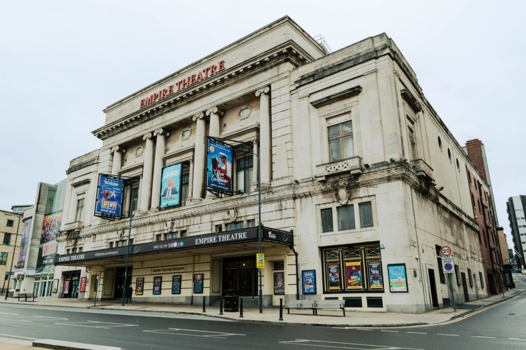 View of the historic Empire Theatre in Liverpool showcasing its neoclassical architecture.