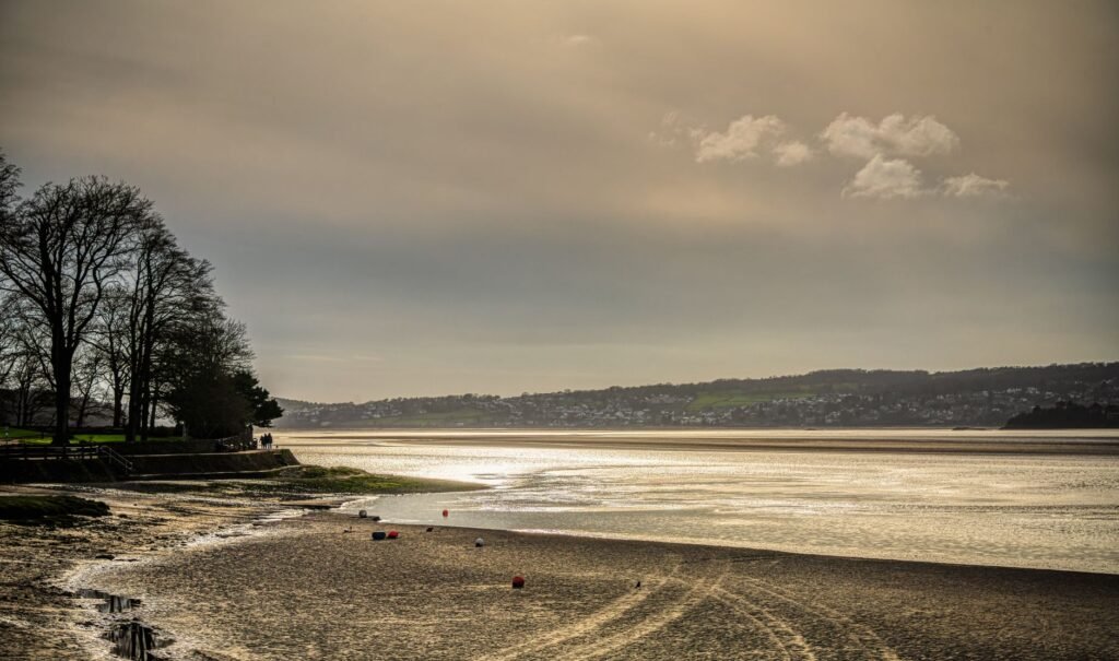 Peaceful waters and landscape at Arnside, England, during a tranquil day.