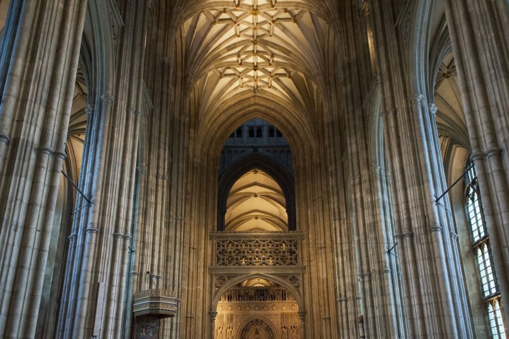 A breathtaking view of the grand Gothic architecture inside Canterbury Cathedral, England.