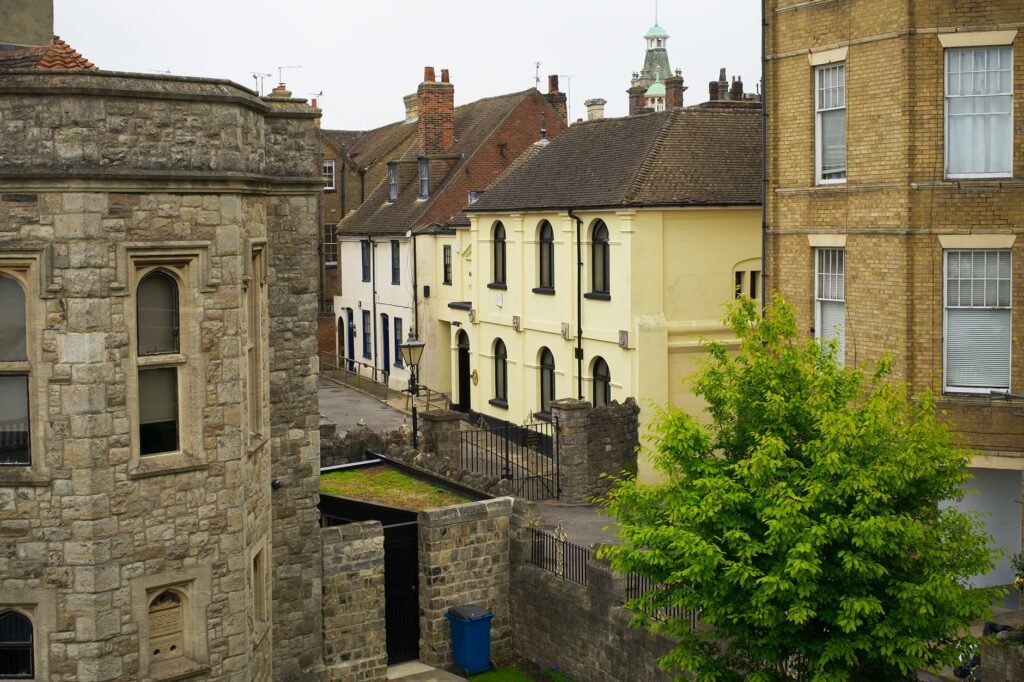 Charming view of historic buildings in Rochester, England, showcasing diverse architecture.