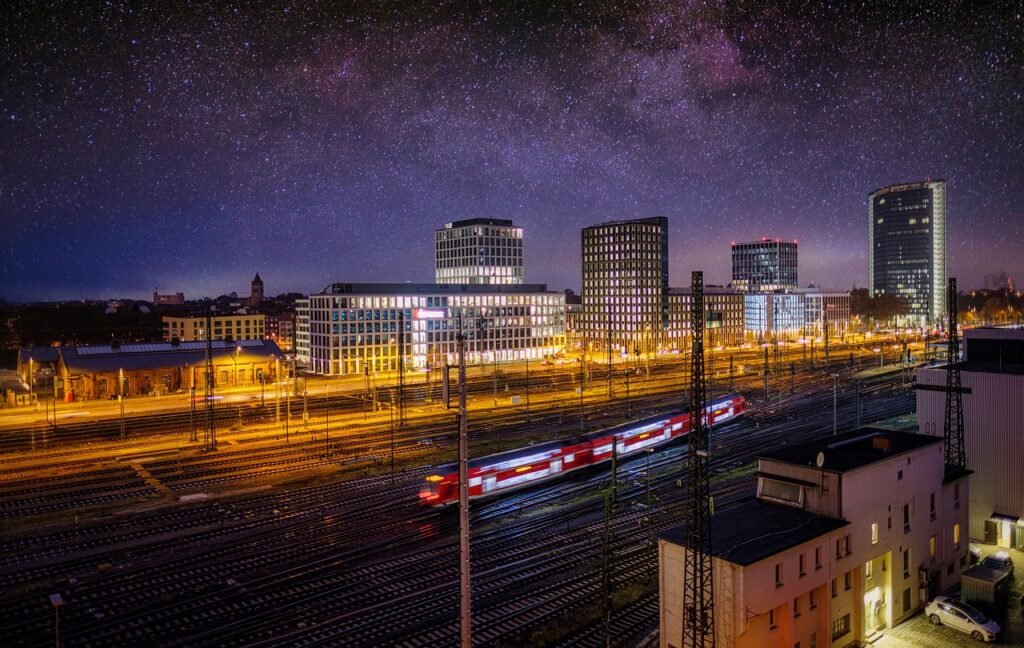 buildings, skyscrapers, train, transport, city, skyline, night, sky, starry sky, milky way, nature, night sky, traffic, light