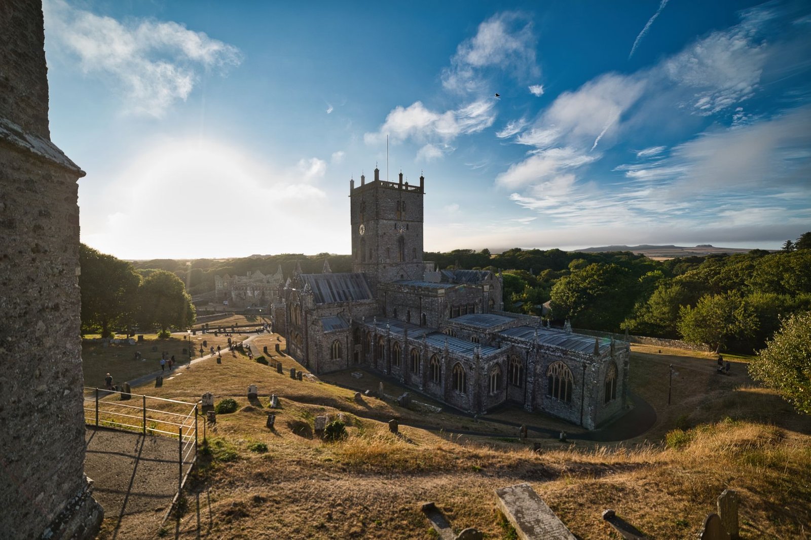 Captivating view of St Davids Cathedral in Wales, showcasing stunning architecture amidst a serene landscape.