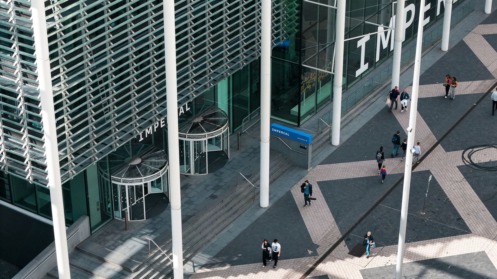 Aerial view of modern architecture and bustling city street in London, UK.