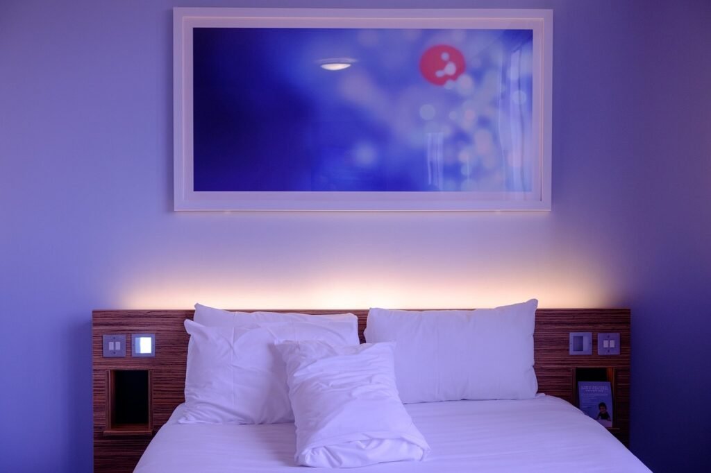 bedroom, hotel room, bed, bed sheets, beddings, pillows, interiors, interior decoration, interior design, white sheets, wall