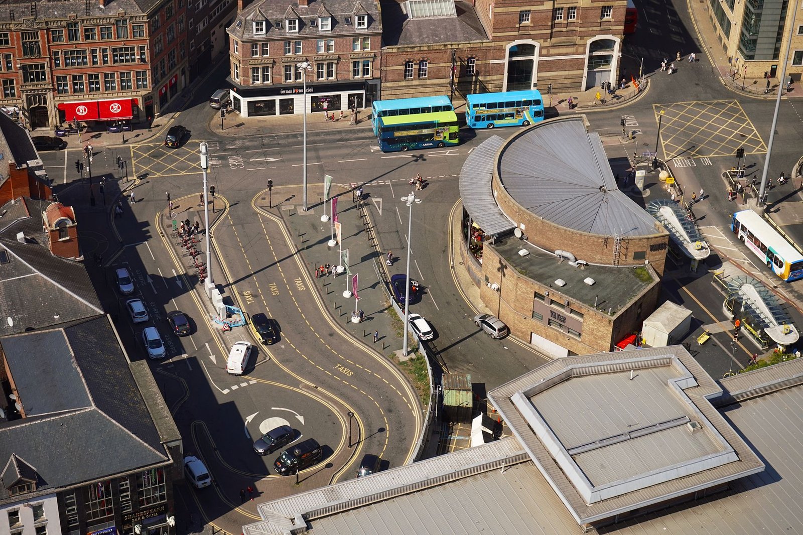 Explore the bustling streets of Liverpool from above, showcasing the dynamic urban landscape.