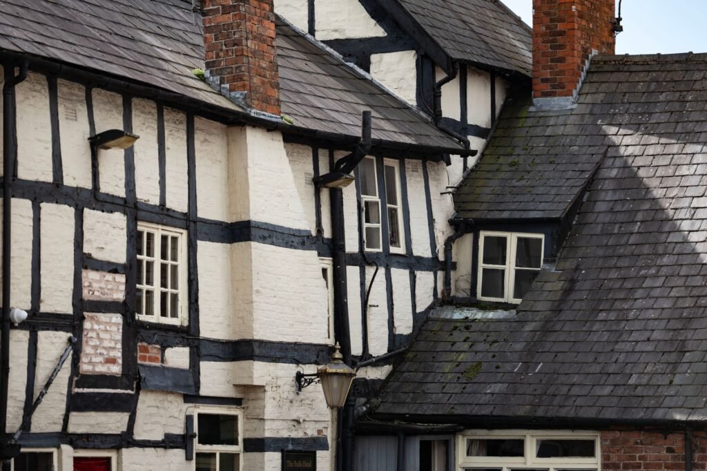Charming Tudor-style buildings in Whitchurch, England showcasing classic timber framing.