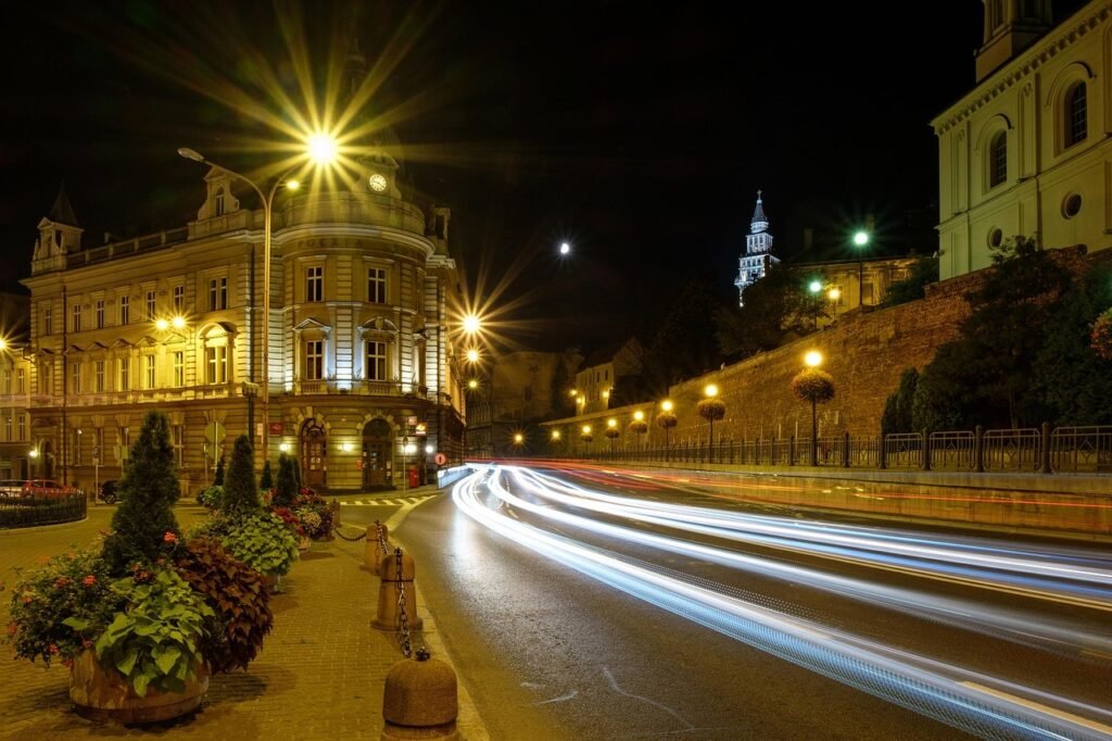 street, lit, city, travel, light, architecture, traffic, building, outside, the area of the city, transport, panoramic, scene