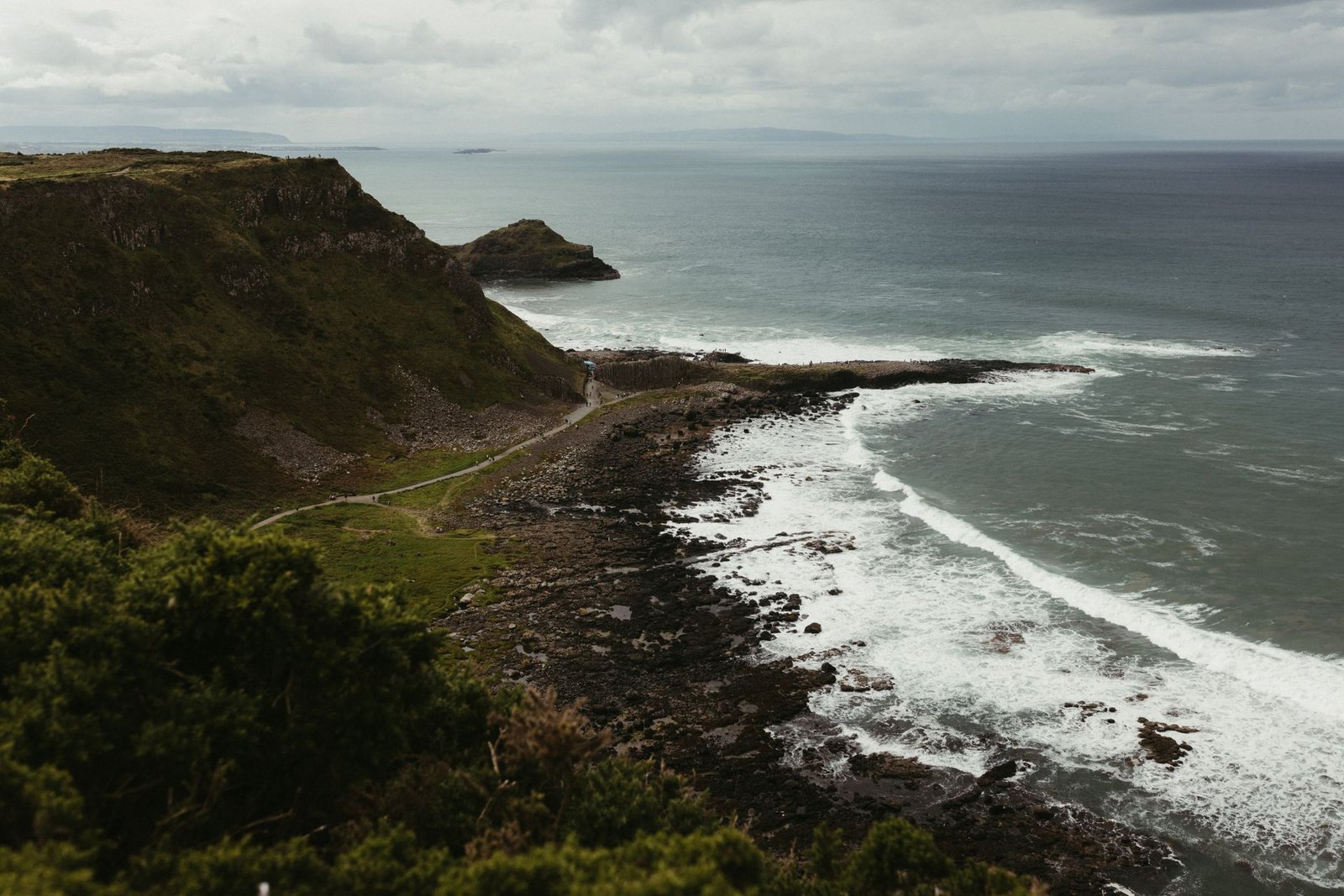 Explore the rugged coastline of Northern Ireland with stunning cliffs and ocean views.
