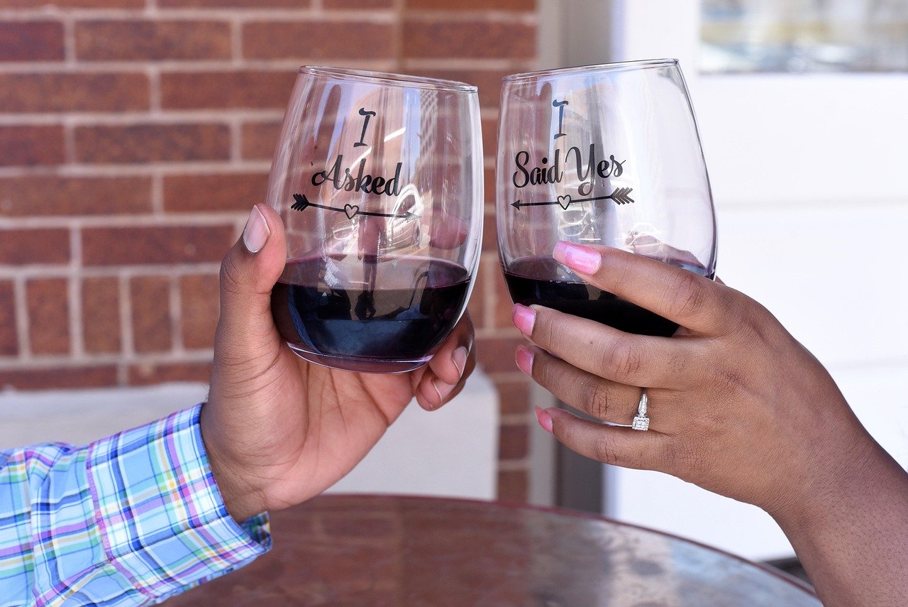 glass, drink, wine, alcohol, bottle, woman, adult, people, table, bar, hand, marriage, propose, proposal, engaged, engage, bl