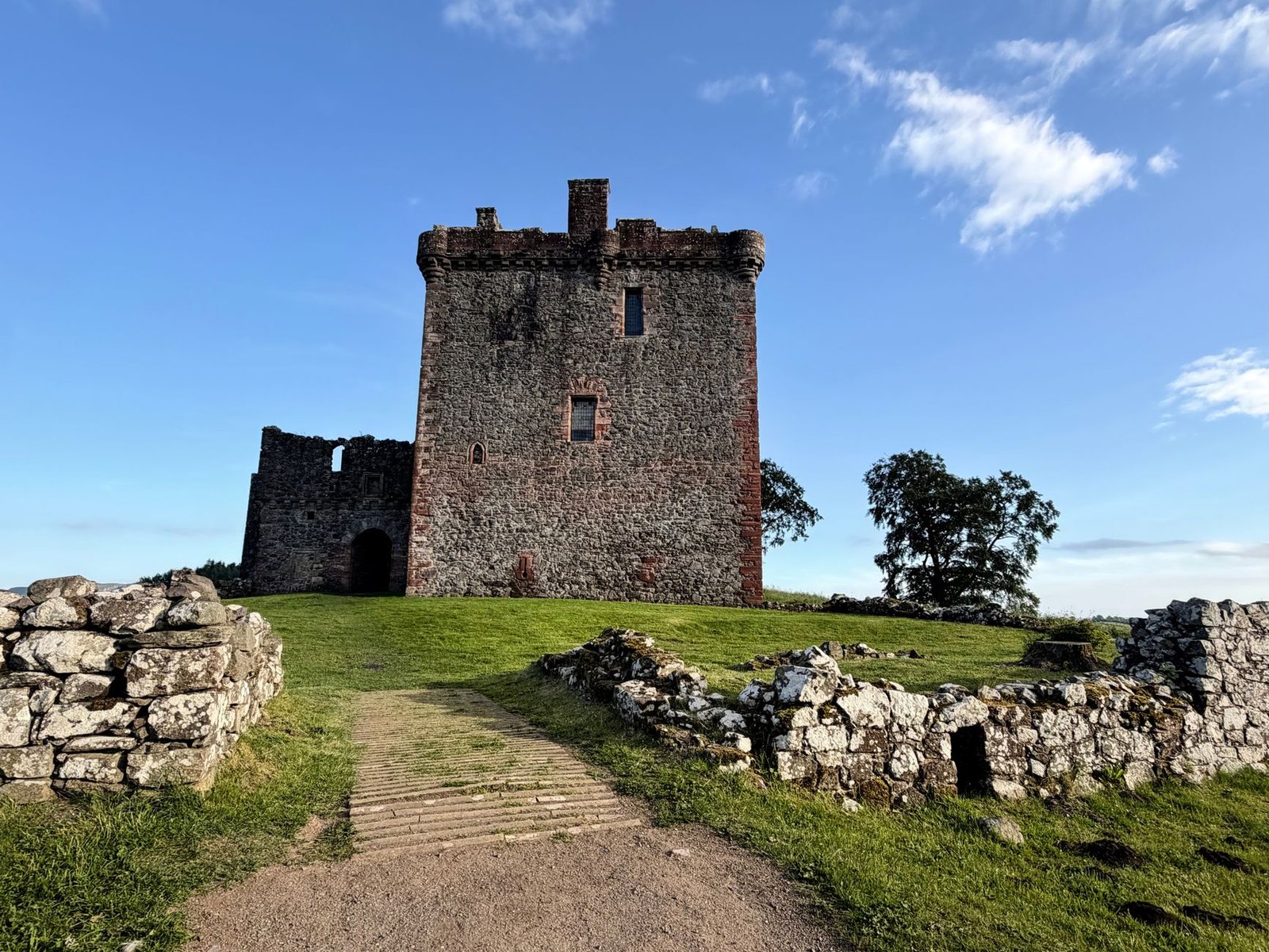 Explore the medieval charm of Huntingtower Castle under a clear blue sky in Perth, Scotland.
