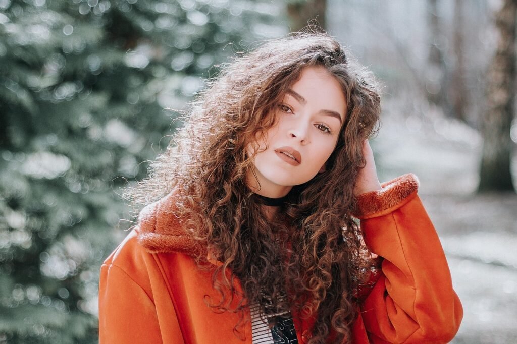 woman, model, pose, style, curly hair, outdoor, fashion, posing, young woman, girl, modeling, female, woman portrait, woman,