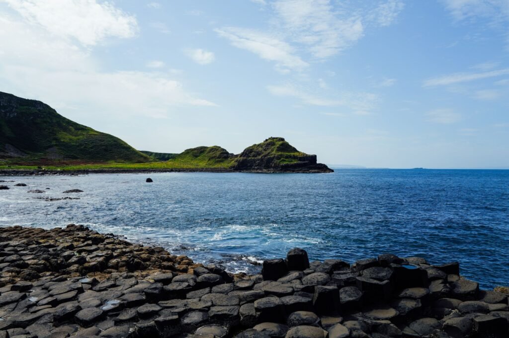 Breathtaking view of the iconic Giant's Causeway basalt columns by the sea in Northern Ireland.