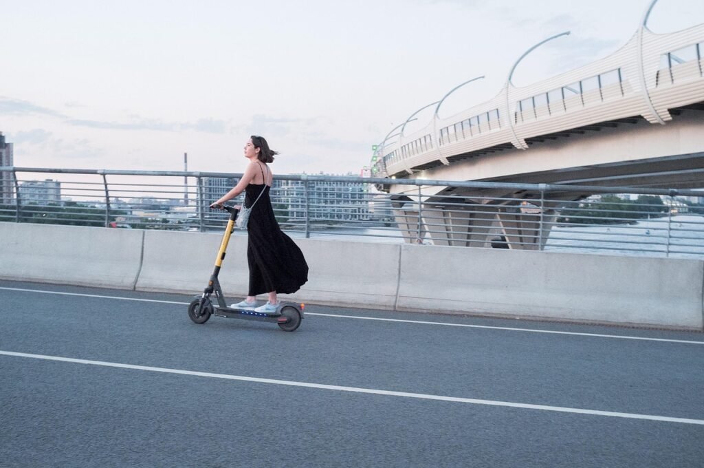 woman, electric scooter, street, scooter, transportation, city, e-scooter, electric scooter, electric scooter, scooter, scoot