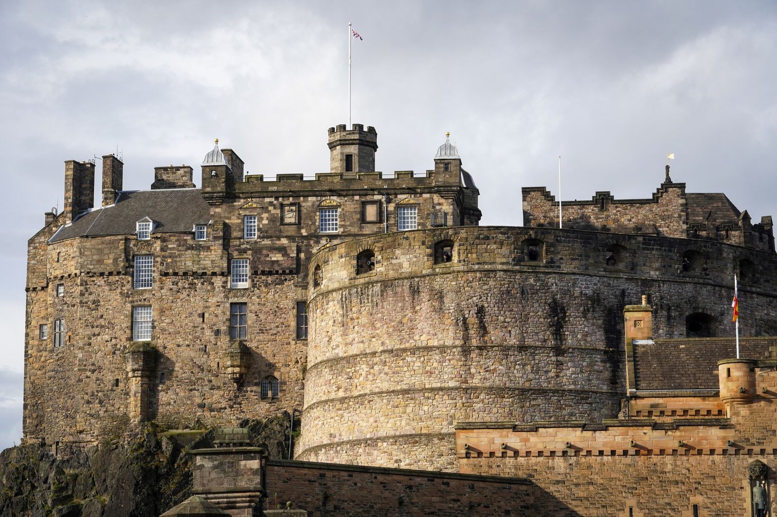 A stunning view of the historic Edinburgh Castle, a prominent landmark in Scotland, captured in daylight.