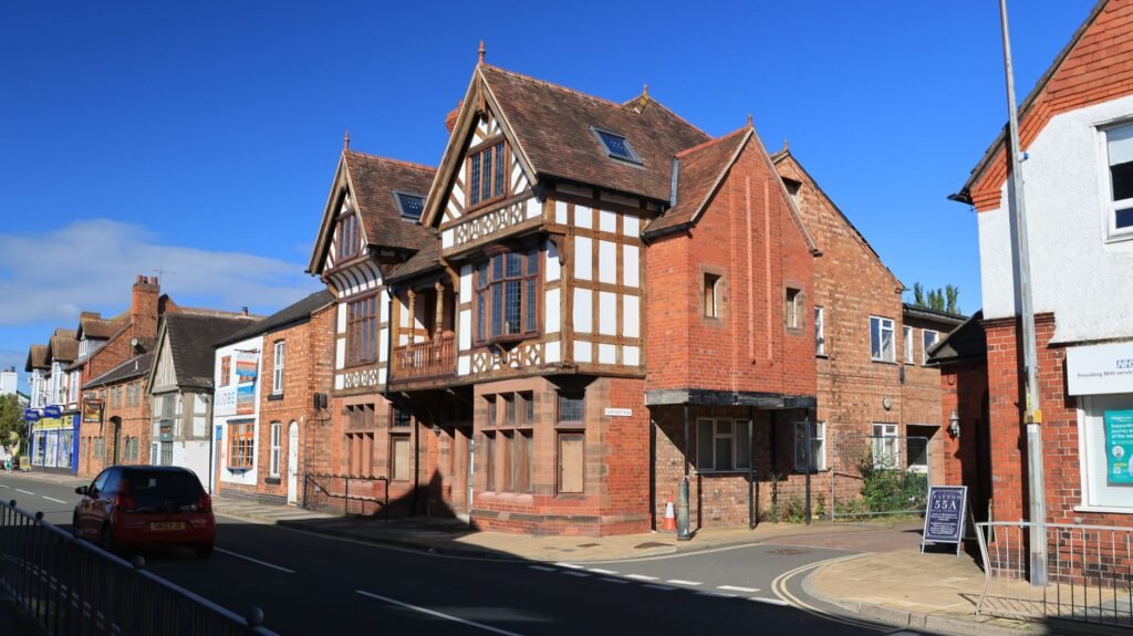 Charming Tudor-style architecture in the town of Nantwich, England, captured on a sunny day.