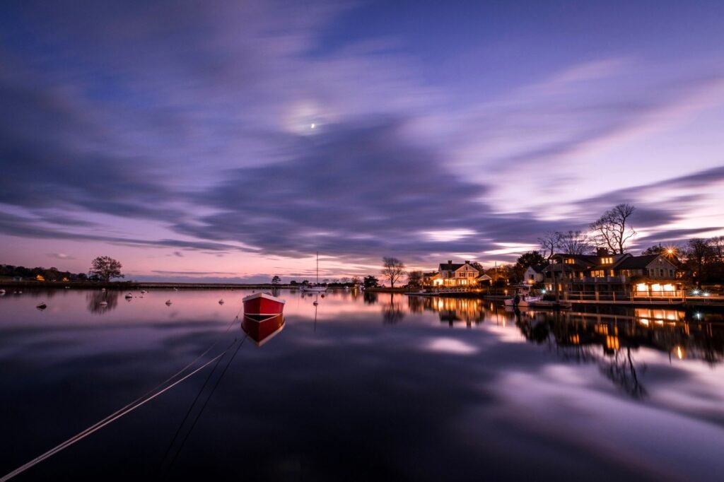 Calm evening scene with reflections on the water in Fairfield, Connecticut.