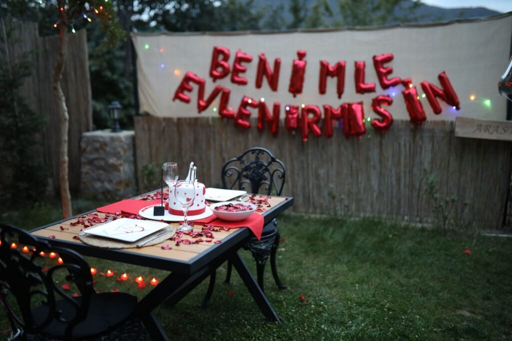 Outdoor romantic dinner setup in Sapanca, Türkiye with proposal decorations.