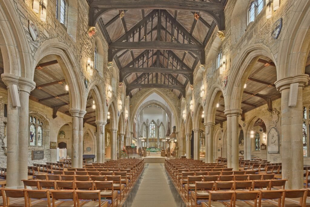 Explore the stunning Gothic architecture of Bradford Cathedral's nave in England.