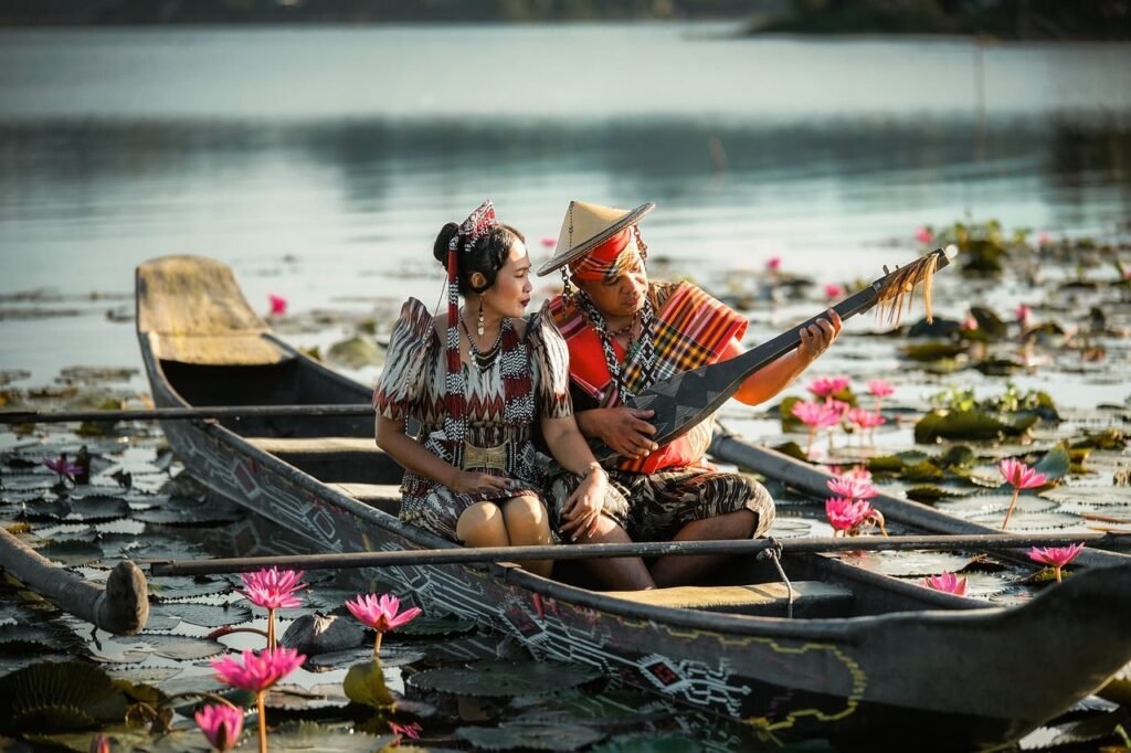 canoe, traditional clothing, nature, musician, paddling, asian culture, lotus flower, traditional musical instrument, people