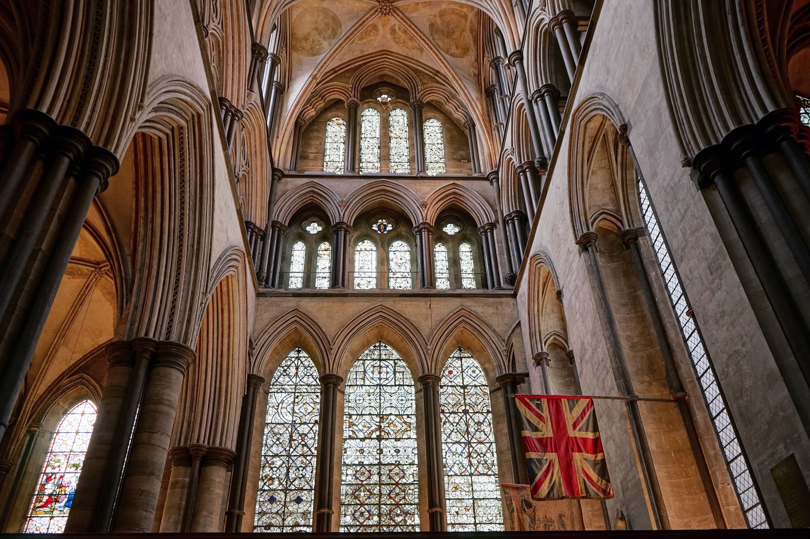 Explore the stunning Gothic architecture of Salisbury Cathedral's interior with intricate details and historic charm.