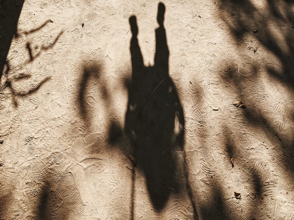 footmarks, footprints, person, sand, shadow, brown sand, footprints, footprints, footprints, sand, sand, sand, shadow, shadow