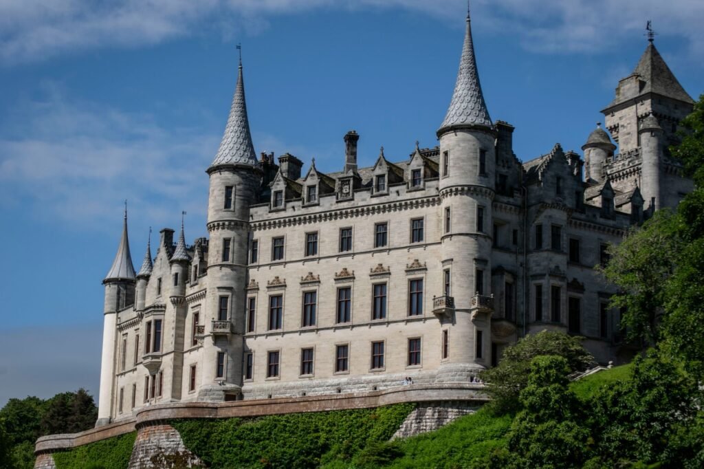 Elegant viewpoint of Dunrobin Castle, showcasing its architectural grandeur in Scotland's scenic landscape.