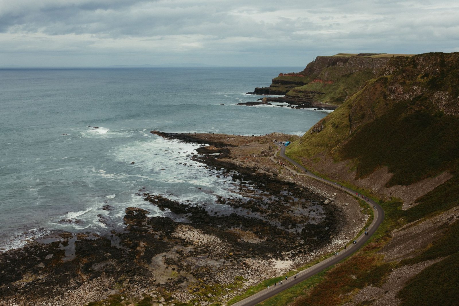 Aerial view of the stunning Giant's Causeway coastline in Northern Ireland, highlighting rugged beauty.
