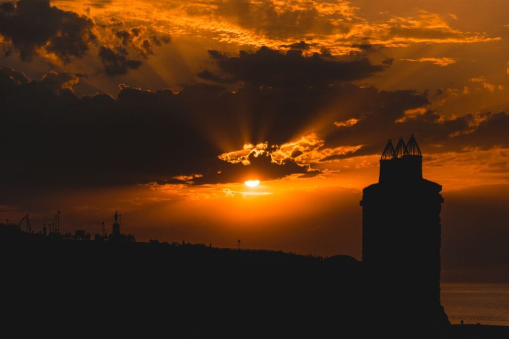 Beautiful sunset over Whitby, England with a dramatic skyline silhouette and vibrant sky.