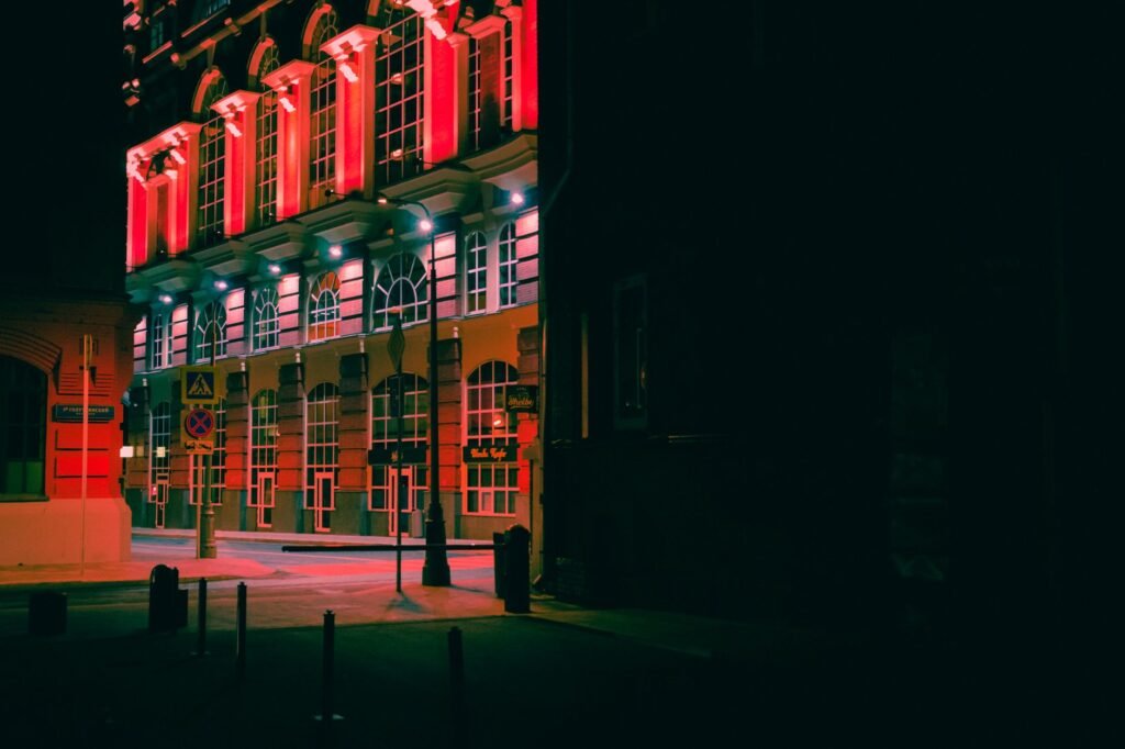 A beautifully illuminated building in Moscow, Russia at night, showcasing stunning architectural details.