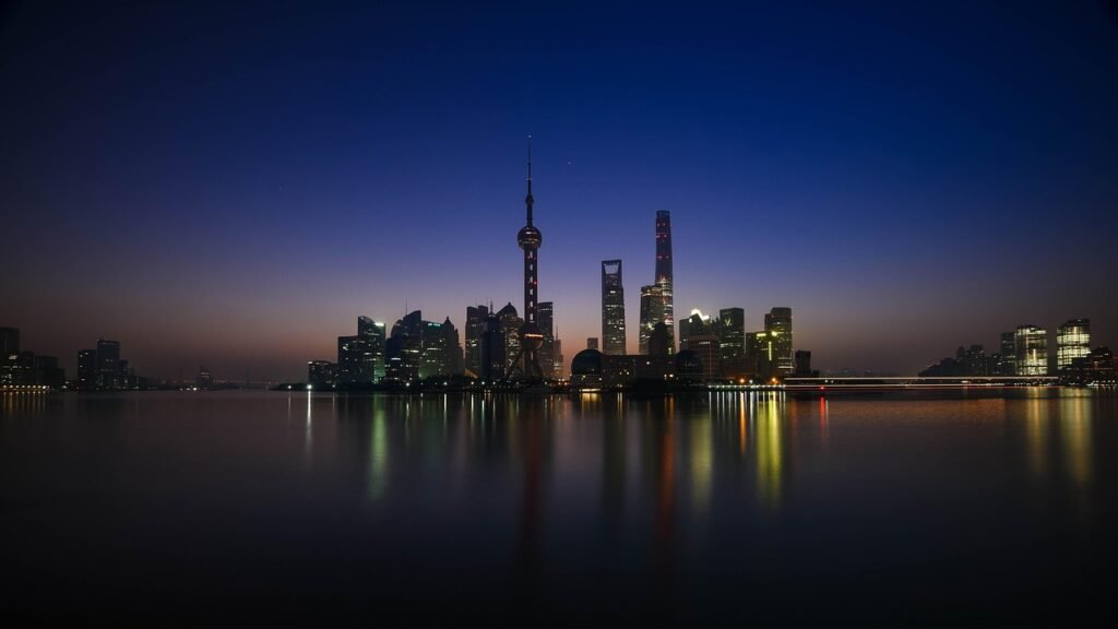 city, river, illuminated, buildings, skyscrapers, tower, city lights, reflection, water reflection, nature, night photography