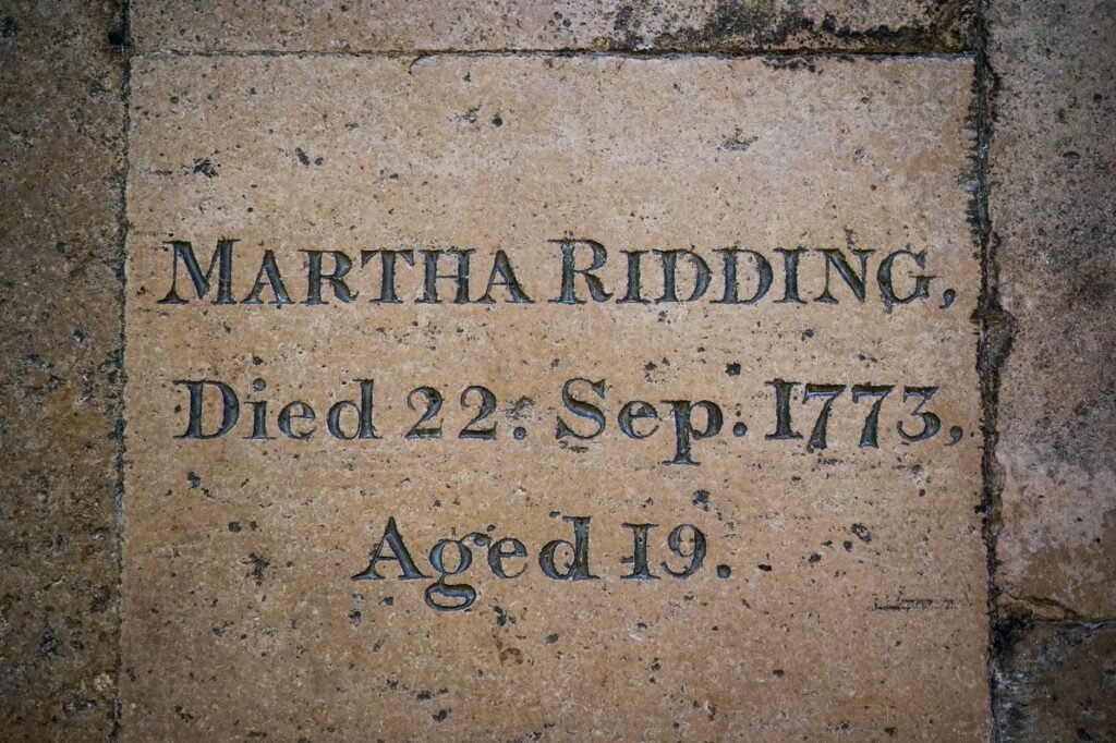 Historic memorial plaque of Martha Ridding dated 1773 in Salisbury, England.