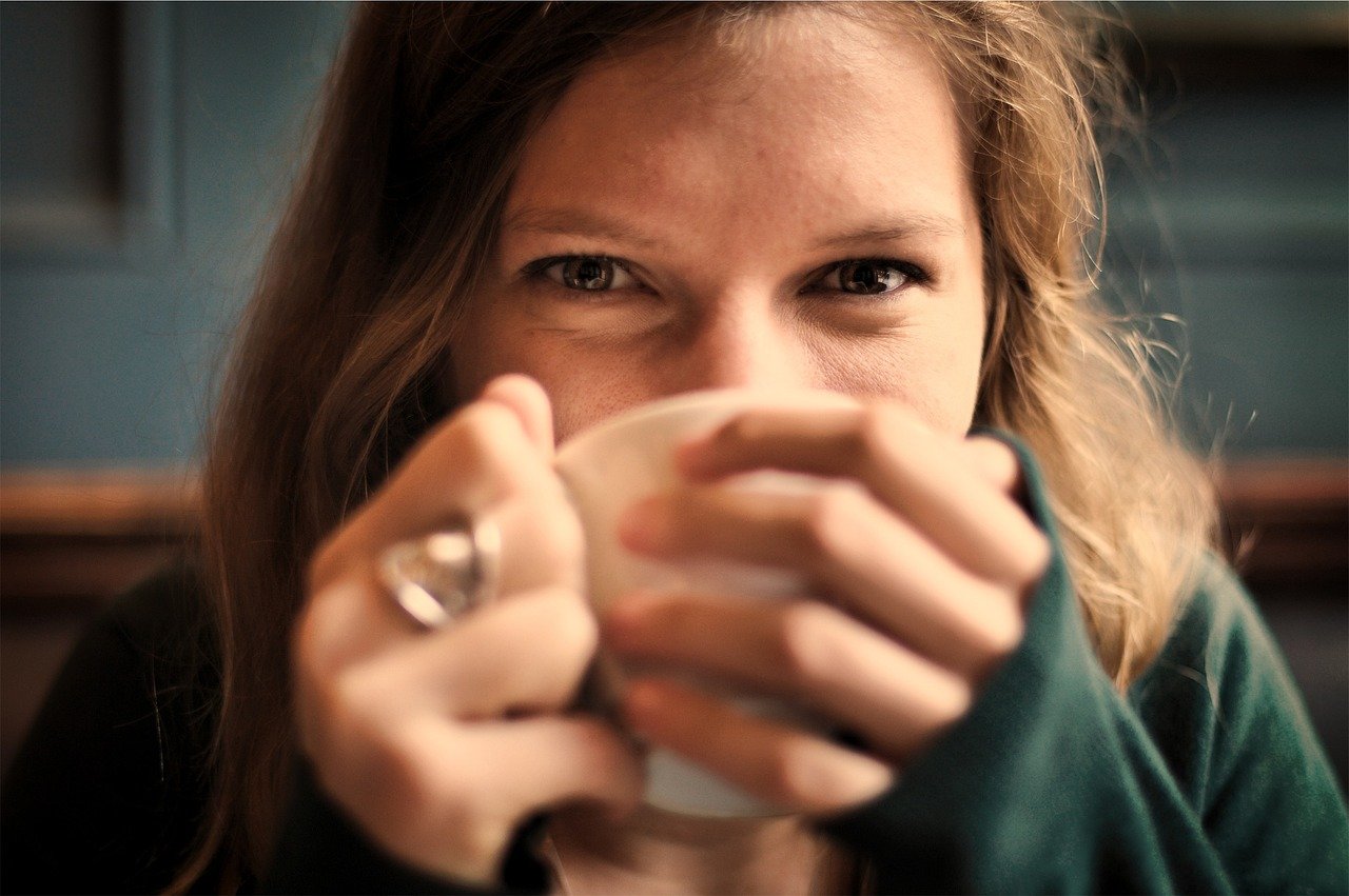 girl, woman, smile, smiling, tea cup, coffee cup, happy, coffee, tea, cup, drinking, eyes, people, cozy, comfortable, relaxed