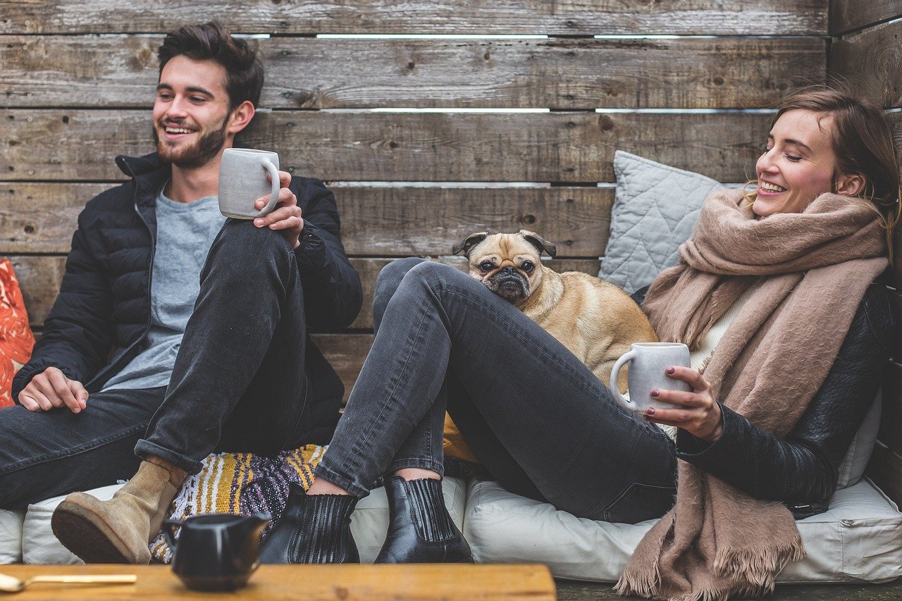 merry christmas, man, woman, dog, pet, pug, owners, couple, relationship, warm clothes, cozy, scarf, jackets, jeans, boots, f