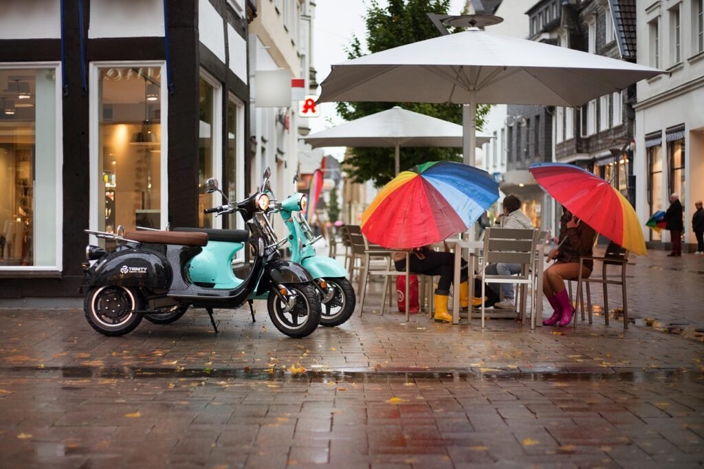 electric scooter, scooter, street, rain, nature, umbrella, woman, cafe, conversation, retro