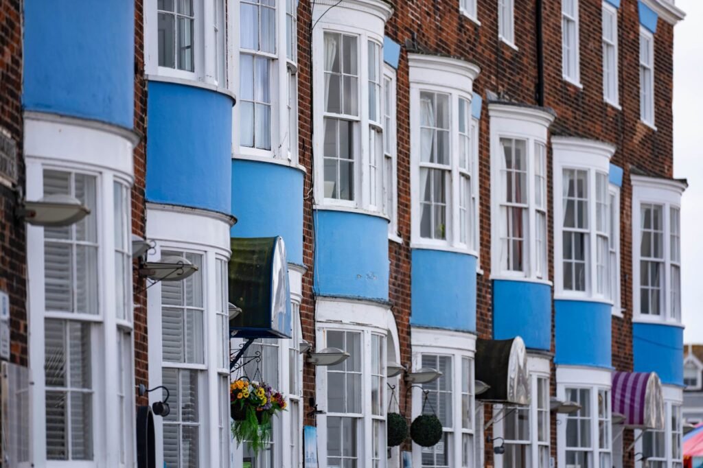 Brightly painted Georgian terraces in Weymouth, England highlighting classic architecture.